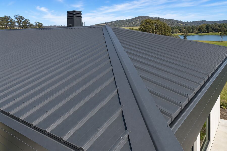 Steel roof sheets being laid on site — supplied by Construction Supplies Australia